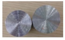 Two test parts, faced with the chuck (left) and mounted directly on the spindle (right)