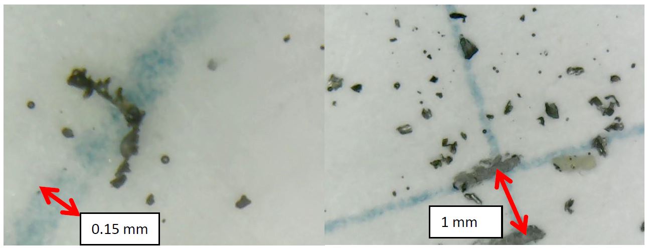 Two microscope images of flint shavings on a gridded surface, the left annotated with a 0.15 mm scale arrow showing a single fine shaving, the right annotated with a 1 mm scale arrow showing a scattering of larger particles