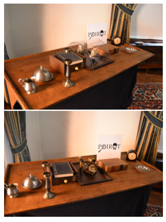 The desk before and after the reveal — the same surface, carrying two entirely different sets of props