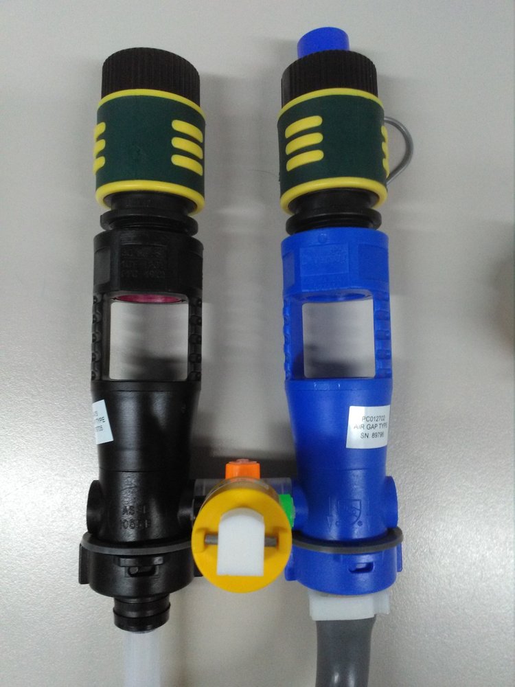 Two plastic prototype assemblies side by side, one black and yellow and one blue